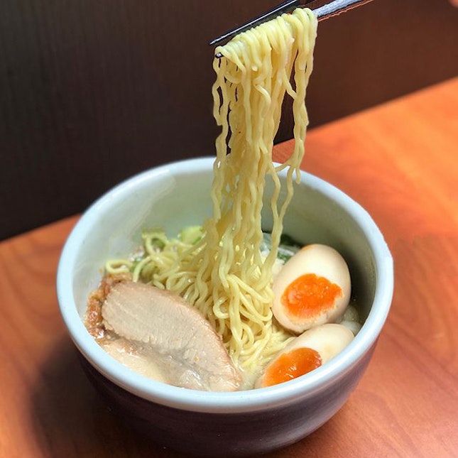 Spicy shio ramen [$16.50++] with flavoured egg [+$1.50++] .
