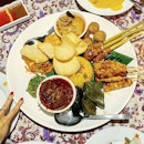 Indonesian Rijsttafel Platter ($80++) consisting of chicken sambal, sate lilit, fish pepes, lawar kacang, perkedel, chicken curry, beef rendang, chicken sate and nasi kuning.