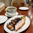 Two roast meat combination of char siew and roast pork.