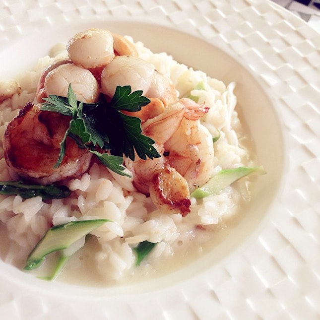 Seafood risotto; scallops, prawns and squid with homegrown organic rice 🌾