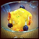 Lime sorbet with passionfruit puree, pomegranate, pomelo and blueberries.