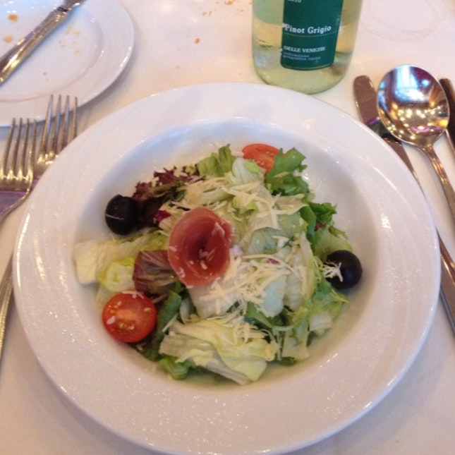 Fresh Veggie Salad with Ham. Wine Pinot Grigio