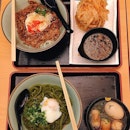 [Idaten Udon] 7/10 
Loved the matcha udon and the beef rice bowl, but I wish the tempura could be fried on the spot instead 😅 affordable and customisable bowls of udon 🍜 Kamatama matcha udon (+$1) with the oden ($3.50 for 5pcs) and Beef sukiyaki rice with mixed vegetables tempura.