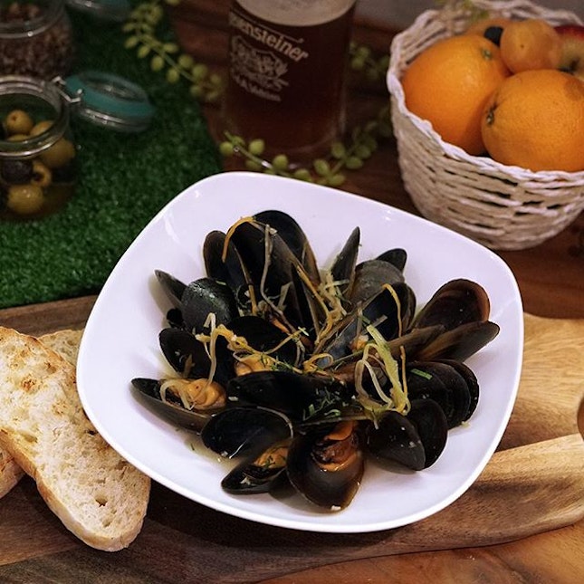 Saddle up partner, to a bowl of white wine infused mussels with fresh herbs and assorted vegetables.