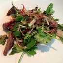 Nahm Dtok Nuer: Spicy grilled #Wagyu #beef salad with shallots, coriander mint, lime, fish sauce & toasted rice dressing.
