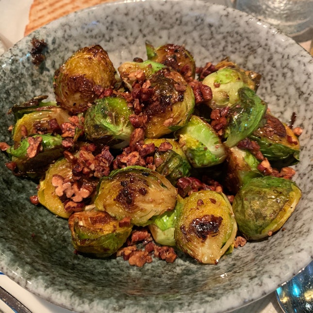 brussels sprouts, pomegranate molasses and candied pecans