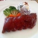 Baby Back Ribs (SGD$20.80) served with seasonal greens, baked potato and cherry tomatoes.