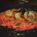 Pretty pink risotto ($26) consists of seafood-simmered risotto in natural colouring (beetroot) topped with succulent pan-seared scallops.