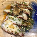 Octopus served with a light dressing, topped with sesame and truffles!