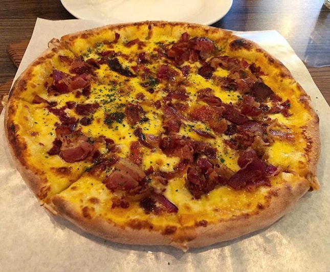 Bacon and cheese pizza.