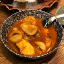 Saloh madu, fish roe and gaewgu fish in yellow curry.