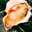 Oyster with ponzu and vinegar jelly.