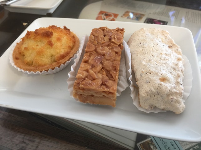 (From left)Coconut tart, Florentine Cookie bar, Almond Finger