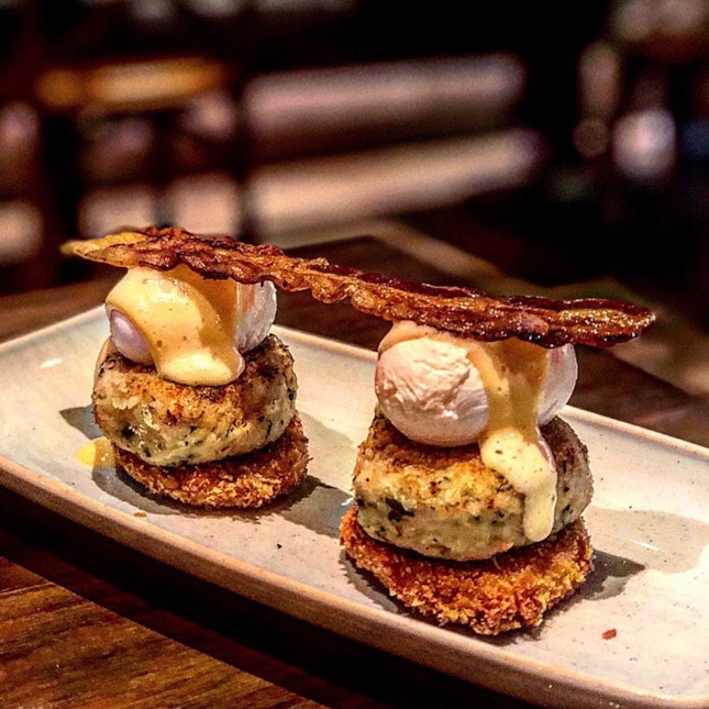 Low Country Crab Cake Benedict: Fried Green Tomato, Poached Farmer’s Eggs, Charred Hollandaise Sauce And Smokey Bacon! ($30)