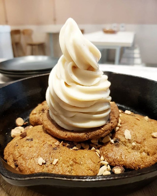 Warm PB Cookie 🍪

PB cookies freshly baked on a skillet, topped with salted speculoos softie swirl and toasted nuts.