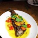 [Kilo Kitchen] - Simply cooked to showcase the flavour the ingredient is the Grilled Whole Rainbow Trout ($46).