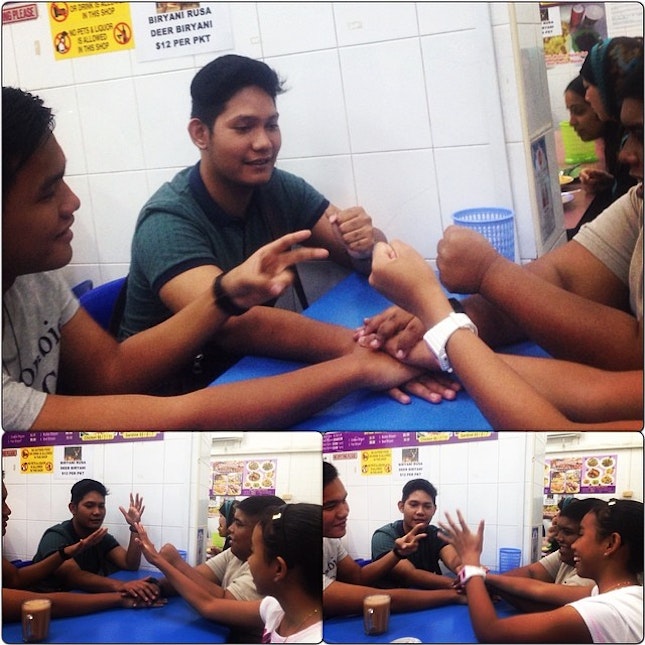 The boys "layan-ing" lil' missy with a game of heart attack!