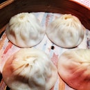 Xiao Long Bao - steamed pork dumpling .