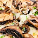 Mushroom pizza at Atlas Pizzeria.