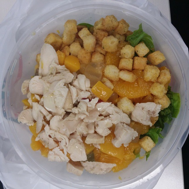Fruit salad with boiled chicken with lemon zest dressing.