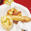 Super good bread basket consisting of French Sticks with Milk Cream, Gruyere Cheese, Anchovy & French Croissants.
