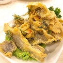 Crispy fish skin with salted egg ($9).